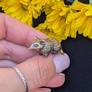 May include: A rustic wooden sign with the text "Welcome to our home" in white lettering. The sign features a distressed finish and a simple, inviting design, perfect for a front porch or entryway.