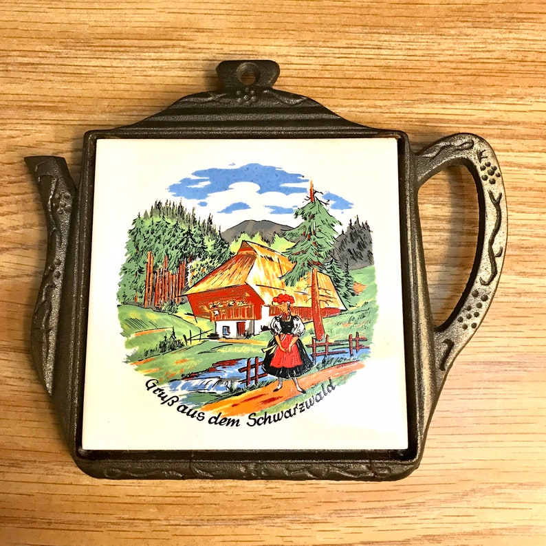 German Trivet With Painted Tile, Teapot Shape, Bronzecolored Cast Iron