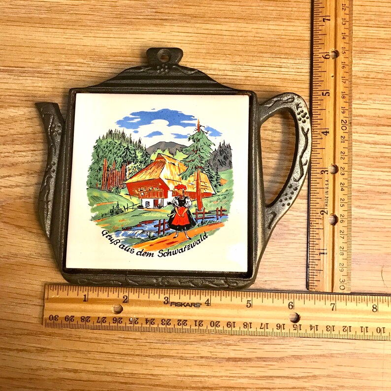 German Trivet With Painted Tile, Teapot Shape, Bronzecolored Cast Iron