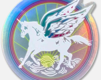 Puede incluir: Un unicornio blanco con alas volando sobre un arcoíris y un sol con olas debajo. El fondo es iridiscente.