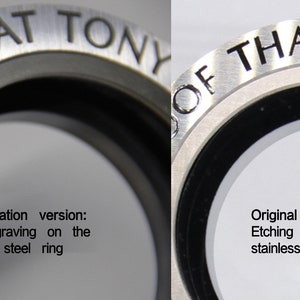 May include: Close-up of two stainless steel rings with the text "PROOF THAT TONY" engraved on one ring and "OF THAT TONY" etched on the other ring. The ring on the left shows a font engraving, while the ring on the right shows an etching.