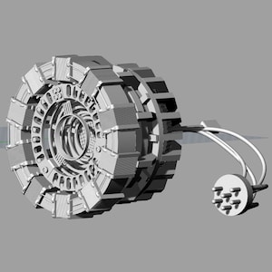 May include: A silver-colored, 3D printed model of a fictional device with a circular, multi-layered design and a cord with a connector on the end.