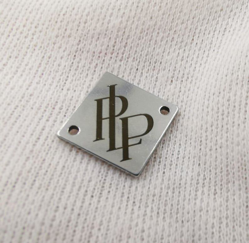 with your logo. 12 mm Square Metal tags 0.5
