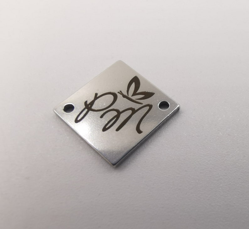 with your logo. 12 mm Square Metal tags 0.5