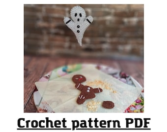 May include: Crochet pattern PDF for a ghost and gingerbread man. The ghost is white with black eyes and a black mouth. The gingerbread man is brown with white icing and red candy.