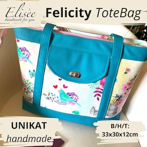 May include: A teal and floral tote bag with the text "Felicity ToteBag". The bag features a teal pocket and handles, with a floral and bird pattern on the sides. The bag measures approximately 13x12x5 inches.