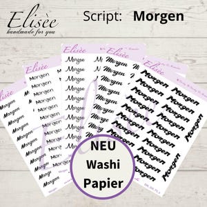 Puede incluir: Una hoja de cinta washi decorativa con la palabra "Morgen" (alemán para "mañana") escrita en letra cursiva. La cinta es blanca con letras negras y está etiquetada como "NEU Washi Papier".