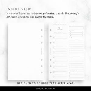 May include: A minimalist planner insert with a white background. The layout includes sections for top priorities, a to-do list, daily schedule, and meal and water tracking. Text on the page reads "01 JANUARY" and "DESIGNED TO BE USED YEAR AFTER YEAR."