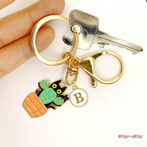 Black Cat in Cactus Pot Keychain - Funny Enamel Cat Charm - Quirky Plant Lover Accessory - Cute Cat Keyring for Cactus and Cat Fans-K-A022-7