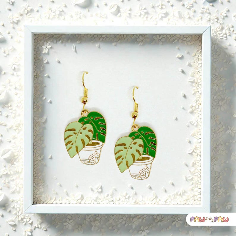 Monstera plant leaf dangle earrings with enamel charms and 18k gold-plated hooks, perfect for plant ladies and nature lovers.