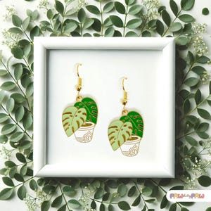 Monstera plant leaf dangle earrings with enamel charms and 18k gold-plated hooks, perfect for plant ladies and nature lovers.