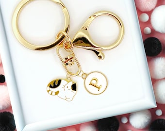 DRAFT - Black and White Calico Cat Keychain with Gold Initial Charm – Cute Enamel Kitty Accessory for Cat Lovers and Kawaii Gift