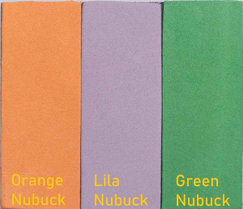 May include: Three swatches of leather in orange, lilac, and green. Each swatch has the word "Nubuck" written below it in yellow text.
