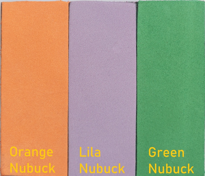 May include: Three swatches of leather in orange, lilac, and green. Each swatch has the word "Nubuck" written below it in yellow text.