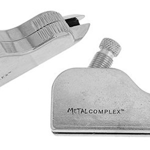 May include: Two silver metal tools with the text "METALCOMPLEX" on them. The tools are used for trimming and shaping wood.