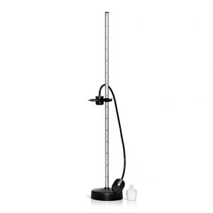 May include: A black and silver laboratory stand with a vertical measuring rod. The stand has a circular base and a black hose connected to a small white bottle. The measuring rod has markings.