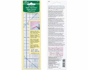 Peut inclure: Une règle thermique Clover mesurant 63,5 par 254 mm, présentée dans son emballage d'origine. La règle jaune transparente comporte des lignes de grille bleues et des repères pour mesurer, marquer, plier et repasser les ourlets et coins.