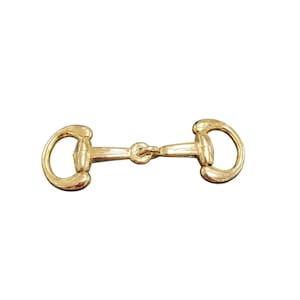 May include: A polished gold-tone metal horsebit hardware piece featuring a central ring connector flanked by two D-shaped loops. This decorative fastener has a smooth, reflective surface and a symmetrical design, commonly used for leather goods.