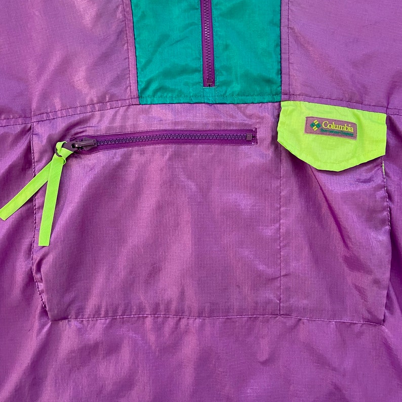 columbia radial sleeve pullover windbreaker jacket adult small 90s purple green neon hooded lightweight coat rare mens vintage clothing