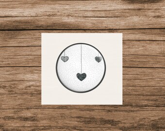 Round badge illustration hearts black and white for child and adult to hang on a jacket or bag