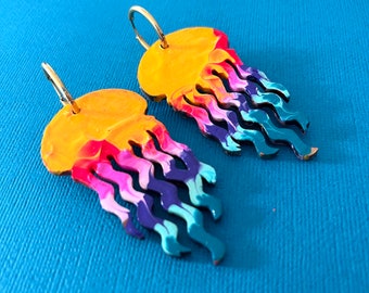 Jellyfish wood midi hoop earrings! Hand painted, stainless steel huggie, glitter resin back, lightweight. Sunset blue, pink, mustard yellow