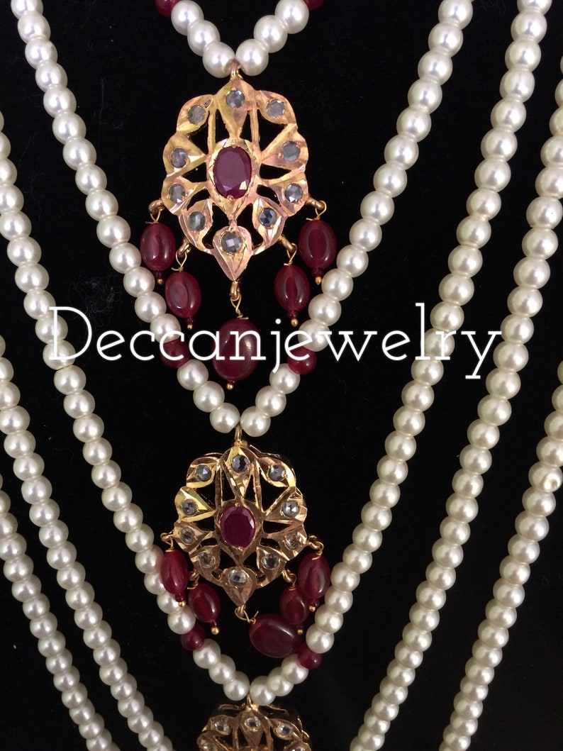 indian jewellery Soha hyderabadi jadau Satlada with earrings in rubies