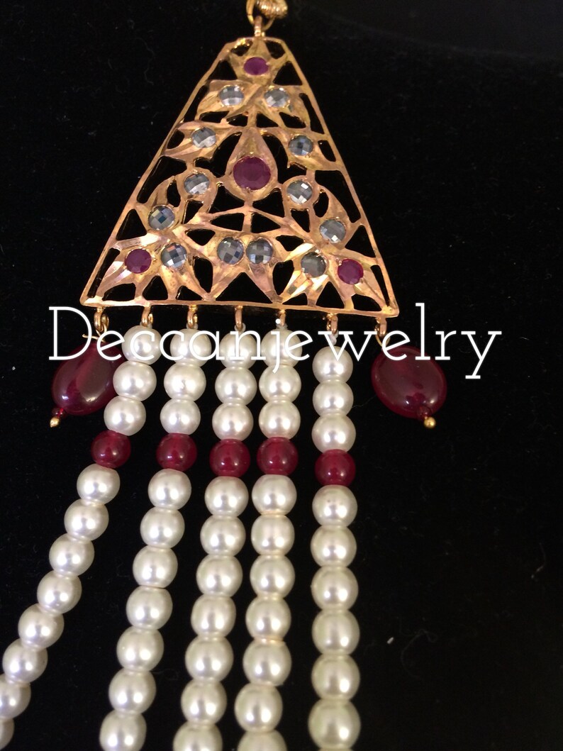 indian jewellery Soha hyderabadi jadau Satlada with earrings in rubies