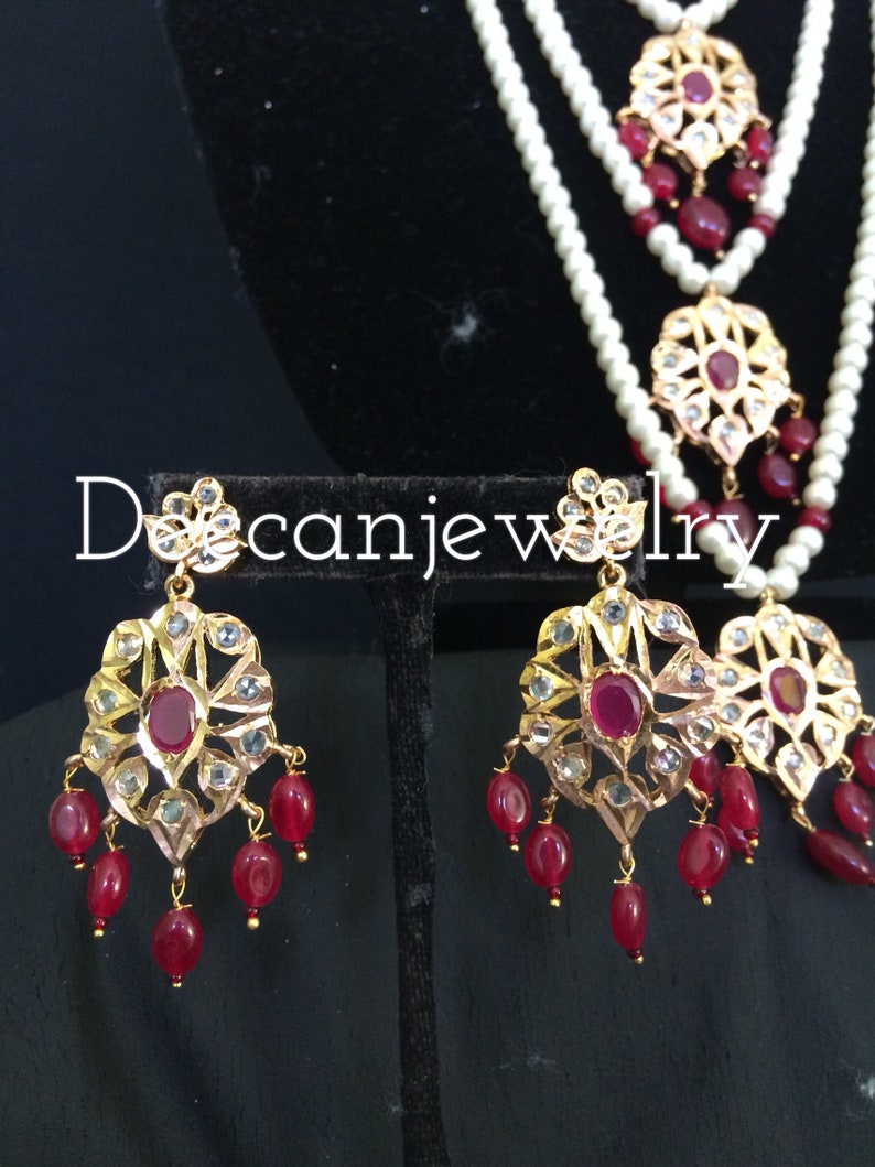 indian jewellery Soha hyderabadi jadau Satlada with earrings in rubies