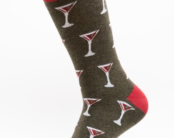 May include: A pair of green socks with a red cuff and a white martini glass pattern.