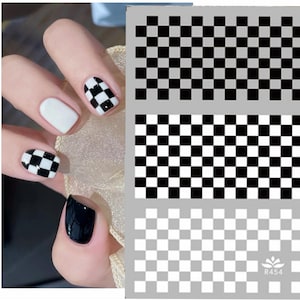 May include: Three black and white checkered nail stencils. The stencils are on a grey background. The stencils are different sizes. The bottom stencil has the text "R454" on it.