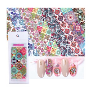 May include: A set of five nail art transfer foils with colorful paisley and geometric patterns. The foils are packaged in a clear plastic bag with the text "Quick Art Film".