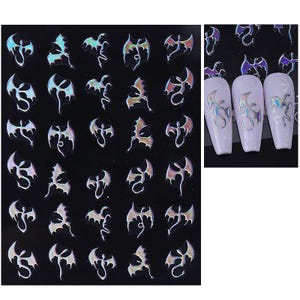 May include: Sheet of iridescent dragon nail art stickers on a black background. The stickers are in various poses and have a holographic effect. Three nails are shown with the dragon stickers applied.