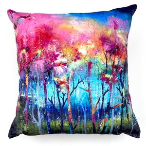 May include: A colourful abstract cushion cover featuring a design of trees and a pink, blue and yellow sky. The cushion cover is made from soft, durable fabric and is ideal for adding a touch of colour and style to any room.