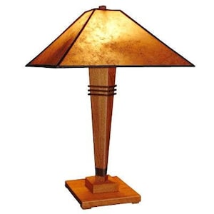 Half Moon Bay Table lamp 26" tall shown in cherry walnut trim amber mica shade