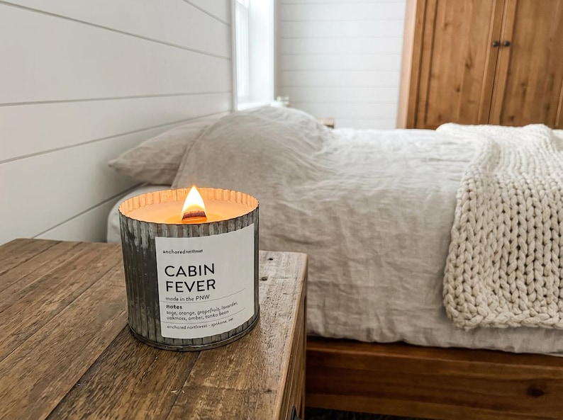 May include: A rustic wooden sign with the text "Welcome to our home" in white lettering. The sign features a distressed finish and a simple, inviting design, perfect for a front porch or entryway.