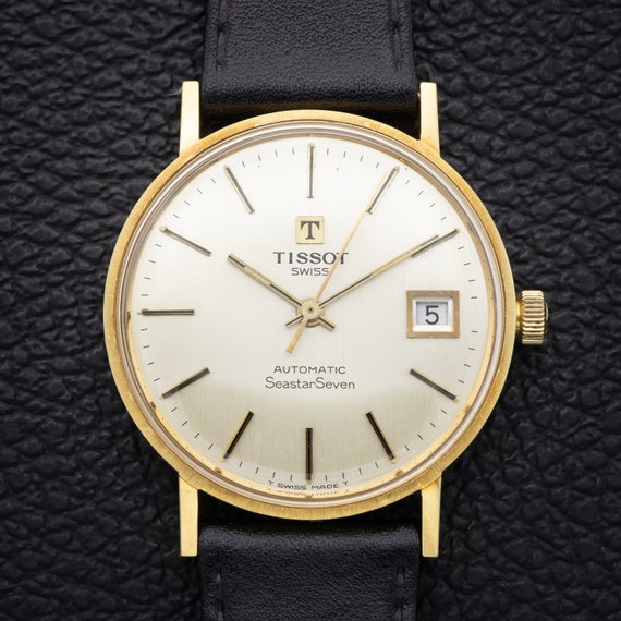 tissot seastar seven 18k