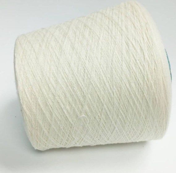 100/% cashmere yarn on cone Italian yarn per 210g. hand and machine knitting