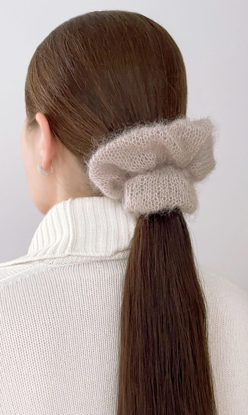 Kid mohair and silk yarn scrunchie in natural light
