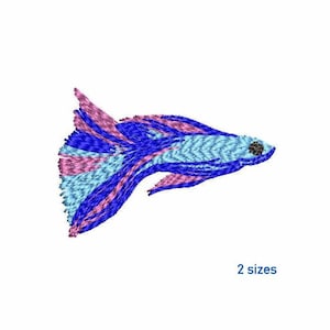 May include: Embroidered design of a blue, pink, and light blue betta fish with a black eye. The fish is swimming to the right. 2 sizes.