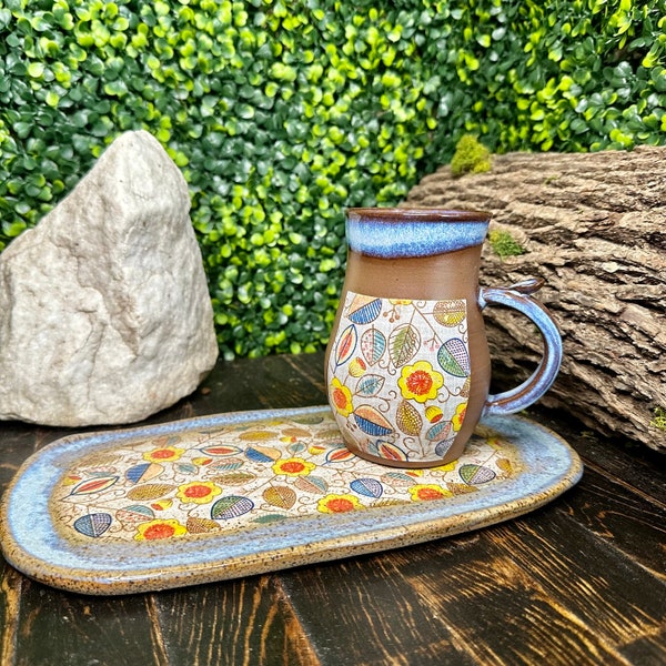 Artisan-crafted handmade pottery mug and plate set, meticulously handcrafted  breakfast ensemble.