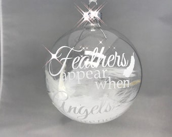 Feathers appear when angels are near Glass bauble memories