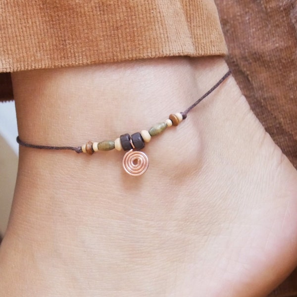 Delicate anklet with spiral and wooden beads