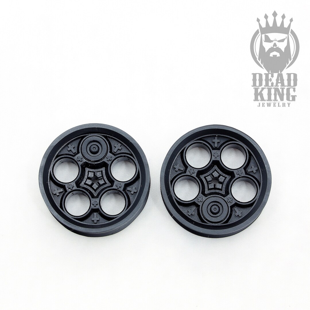 A Pair of Revolver Drum ROUND BLACK Earplugs. Unique Ear Tunnels