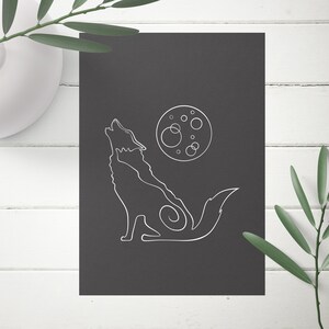 May include: A black and white line drawing of a wolf howling at the moon. The moon is a circle with a white outline and a few small circles inside.
