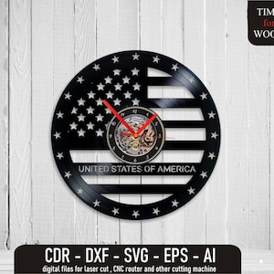 May include: A black vinyl record clock with a design of the American flag and the words "United States of America". The clock has a red second hand and a silver clock face.