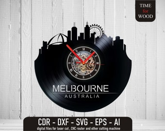 May include: Black vinyl record clock featuring a silhouette of the Melbourne skyline with the text "MELBOURNE AUSTRALIA".