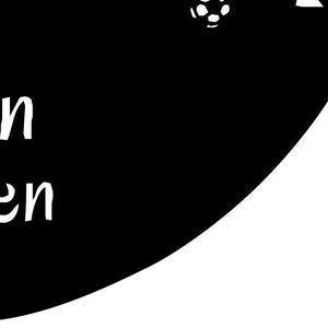 May include: Black and white sign with the text "Tavern" and "Kitchen" in a cursive font. A soccer ball is in the upper right corner of the sign.