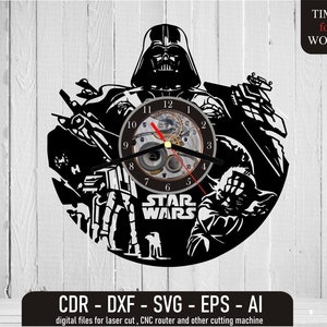 May include: Black and white silhouette of Darth Vader and Yoda from Star Wars, with a clock face in the center. The clock face has a steampunk design with gears and a red second hand. The text "STAR WARS" is below the clock face.
