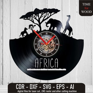 May include: Black vinyl record clock with a silhouette of an elephant, giraffe, and two zebras in front of a tree. The clock face is white with black Roman numerals and the word "AFRICA" in white text. The clock is on a white wood background. The text "TIME for WOOD" is in the upper right corner of the image.