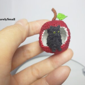 Miniature Crochet Cat in Apple: Fluffy Amigurumi Figurine
